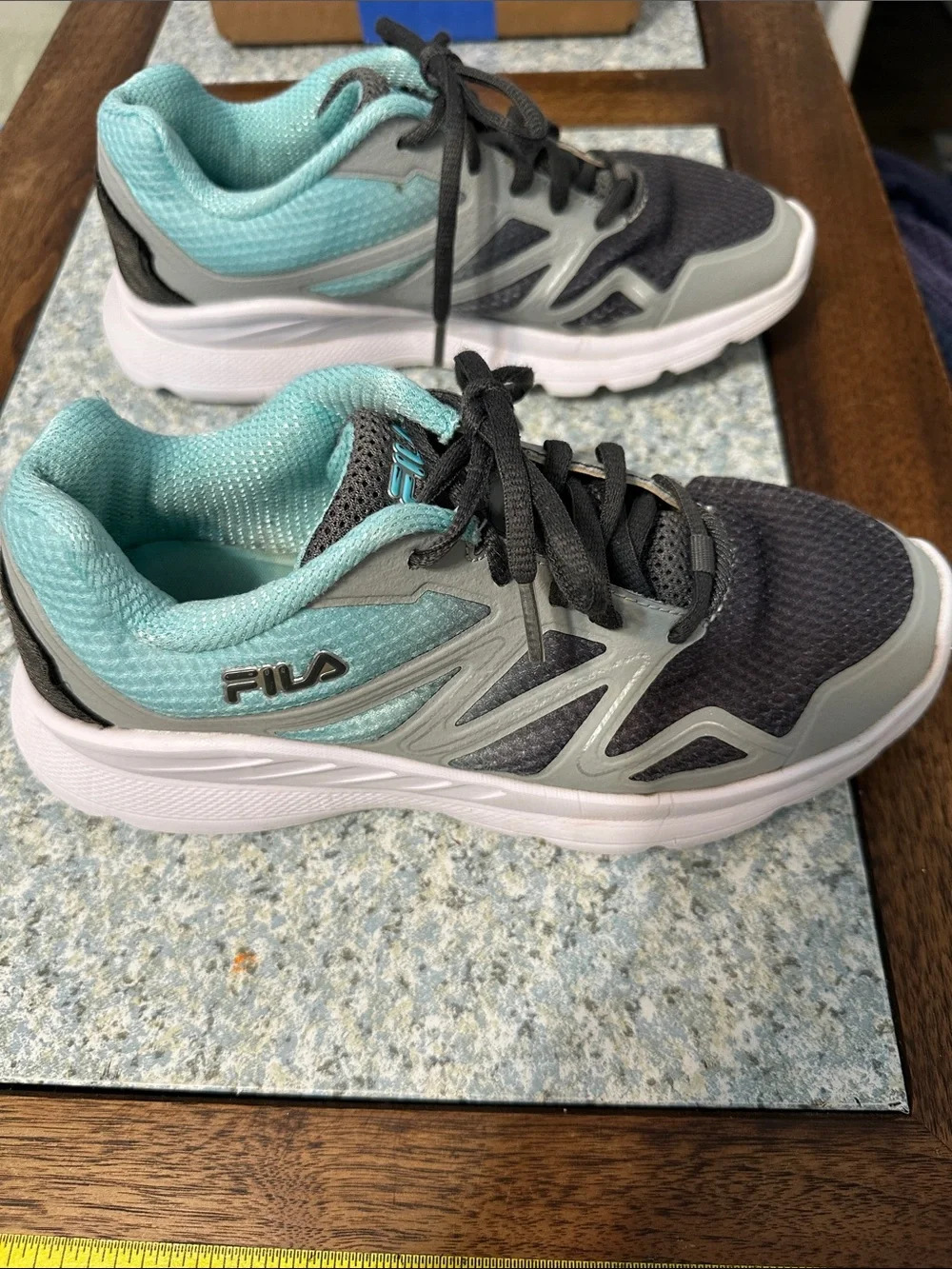 Fila women’s sneakers. Ultra lightweight. Size 6.5. Gray and teal. Breathable